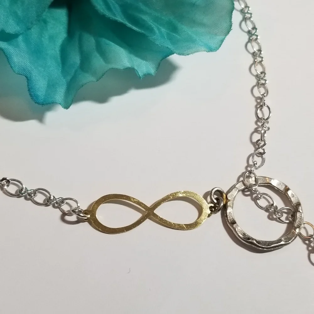 Infinity symbol necklace thread through clear briolette silver gold tone